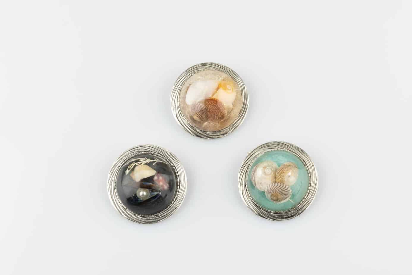 Chunky round dome beach brooch.