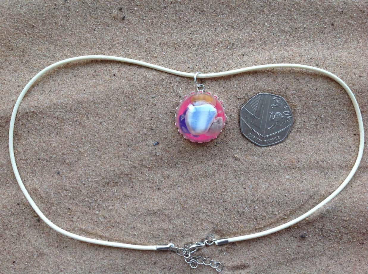 glass and resin pendant